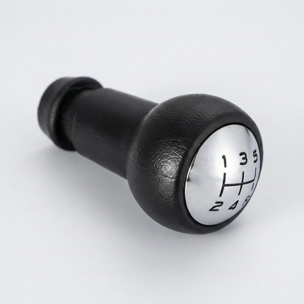 Pommeau de vitesse peugeot 207 sur fond gris côté gauche