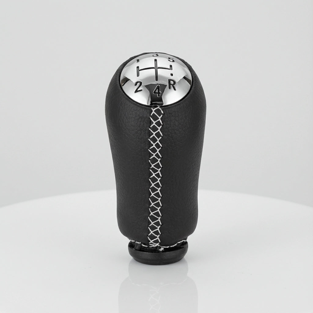 Pommeau de vitesse clio 3 - 5 vitesses - Couture blanche - gros plan