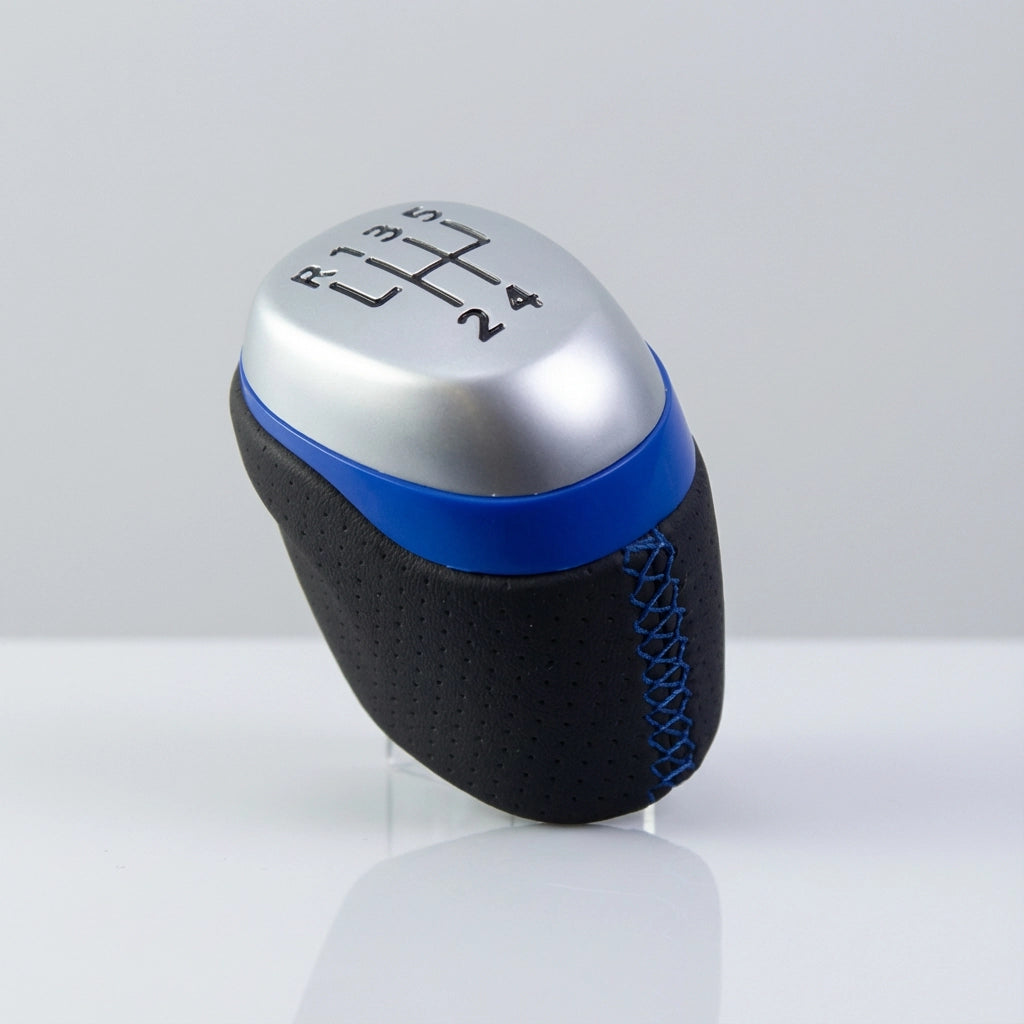 Pommeau de vitesse clio 4 - 5 vitesses - Couture bleu - gros plan